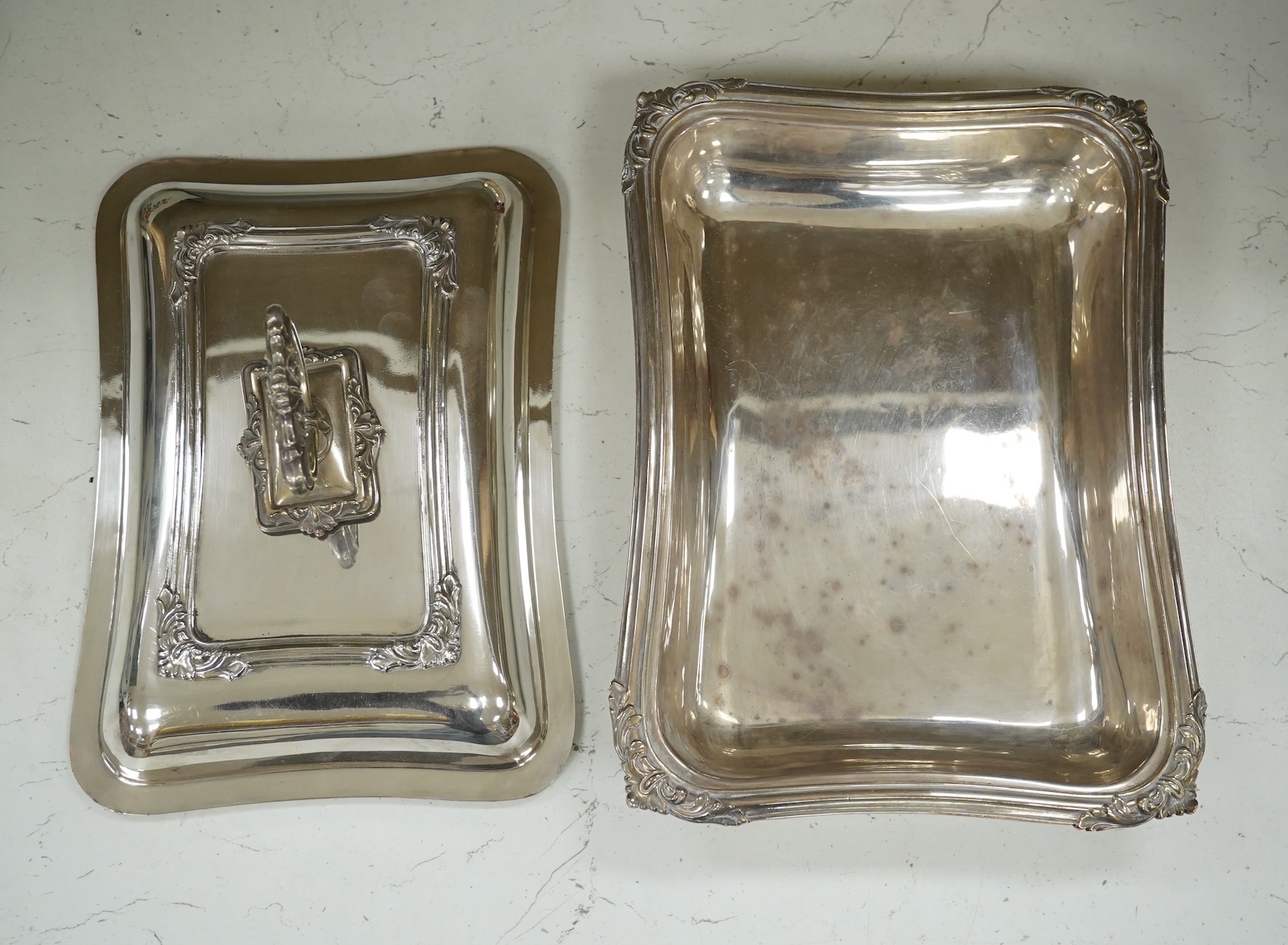 A pair of electroplate entrée dishes and covers, 30cm. Condition - fair to good